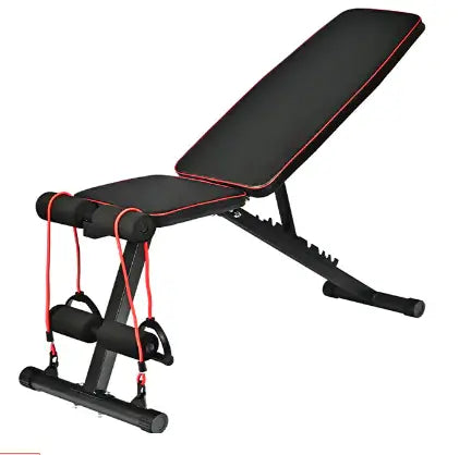 Adjustable foldable home gym bench with resistance bands for versatile workouts and easy storage.