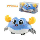 Cute blue crawling crab toy in a PVC box, designed for sensory play and baby engagement.