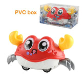 Cute crawling crab toy for babies in a PVC box, promoting sensory play and movement.